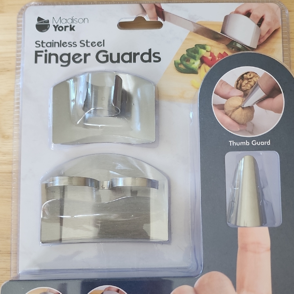NIB STAINLESS STEEL FINGER GUARDS